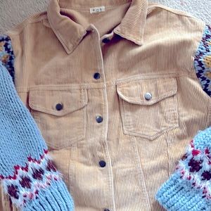 This is such a cute jacket with knitted arms distressed bottom